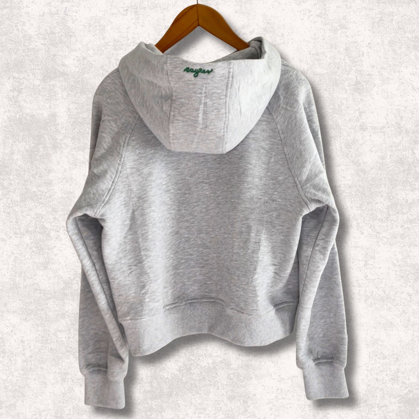 Back of grey hoodie showing Eagles embroidery on hood.